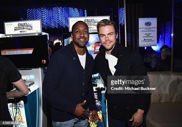 Actor Jaleel White and actor Derek Hough enjoy the festivities during the Super Smash Bros for Wii U event in West Hollywood, CA on November 11, 2014...