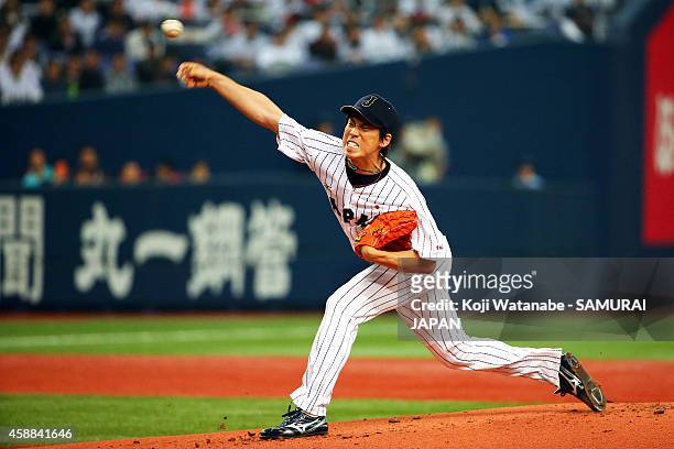 Starting Pitcher Kenta Maeda of Samurai Japan throws a pitch during in the top half of the first inning the game one of Samurai Japan and MLB All...