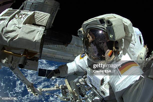 In this handout photo provided by the European Space Agency , German ESA astronaut Alexander Gerst takes a 'selfie' during his spacewalk, whilst...