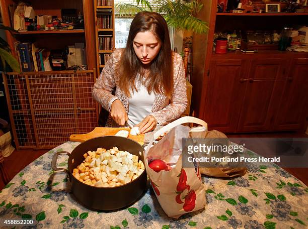 Crystal Goodwin makes apple sauce at her grandmother's house in South Portland on Thursday, October 23, 2014. Goodwin has mast cell activation...
