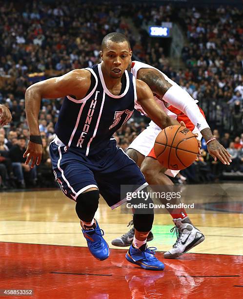 Sebastian Telfair of the Oklahoma City Thunder drives to the basket against th Toronto Raptors during their game at Air Canada Centre on November 4,...