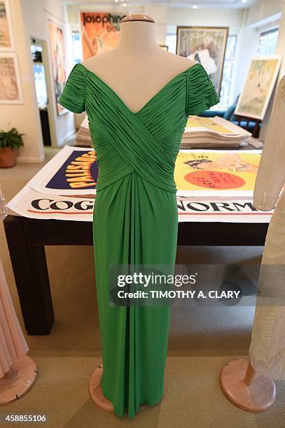 One of four dresses that belonged to Her Royal Highness, Diana, Princess of Wales is displayed during a one day media preview at the Ross Art Gallery...