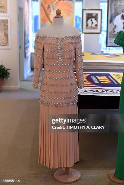 One of our dresses that belonged to Her Royal Highness, Diana, Princess of Wales is displayed during a one day media preview at the Ross Art Gallery...