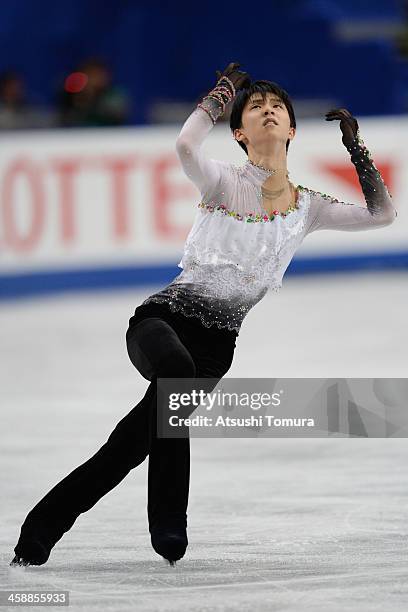 Yuzuru Hanyu of Japan performs in the men's free skating during All Japan Figure Skating Championships at Saitama Super Arena on December 22, 2013 in...