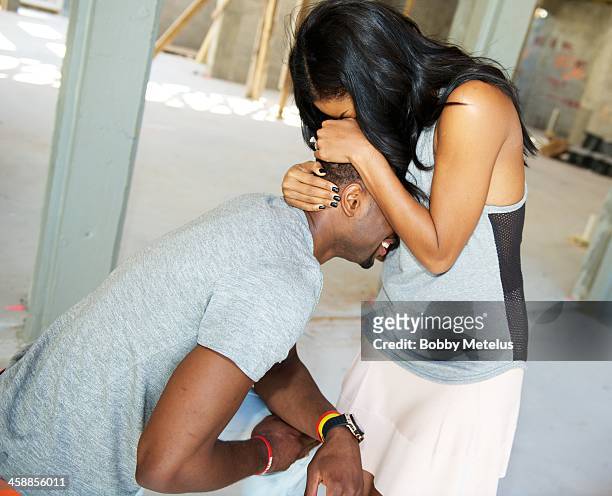 Gabrielle Union embraces her new fiancee Dwyane Wade in the moments after he proposed on December 21, 2013 in Miami, Florida.