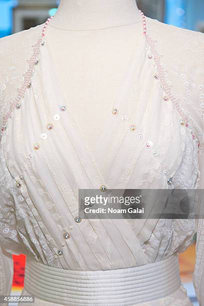 Zandra Rhodes ivory silk chiffon gown embellished with simulated pearls and deep pink faceted glass worn by HRH Princess Diana to the Birthright...