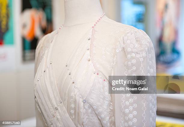 Zandra Rhodes ivory silk chiffon gown embellished with simulated pearls and deep pink faceted glass worn by HRH Princess Diana to the Birthright...