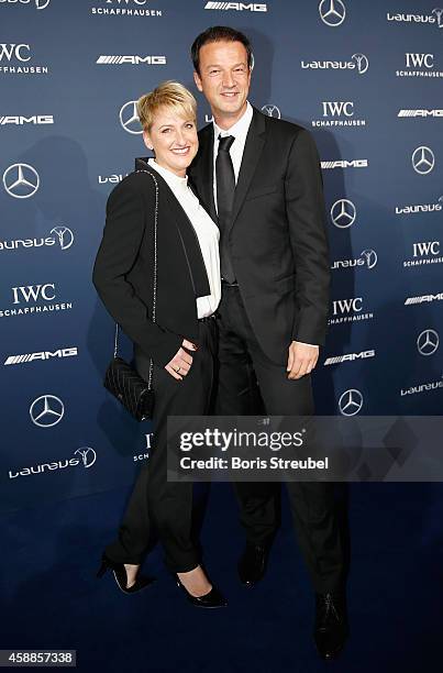 Fredi Bobic, former football player and his wife Britta Bobic pose prior to the Laureus Media Award 2014 at Grand Hyatt Hotel on November 12, 2014 in...