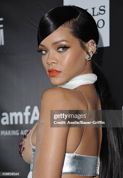 Singer Rihanna arrives at the 2014 amfAR LA Inspiration Gala at Milk Studios on October 29, 2014 in Hollywood, California.