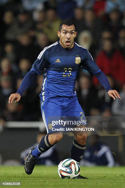 Argentina striker Carlos Tevez runs with the ball during the international friendly football match between Croatia and Argentina at the Boleyn...