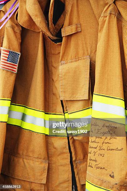 firemen jacket hotshot memorial - fireman uniform stock pictures, royalty-free photos & images