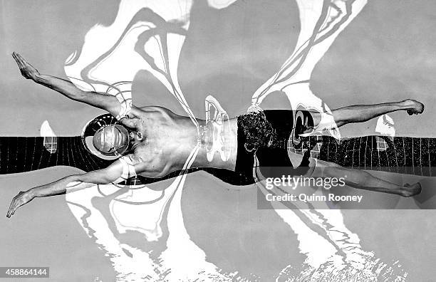 Richard Eliason of Australia competes in the Men's 100 Metre Breaststroke Multi Class during day four of the World Swimming Championships at SA...