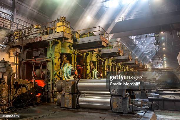 rolling mill ausstattung - rohstoffverarbeitende-fabrik stock-fotos und bilder