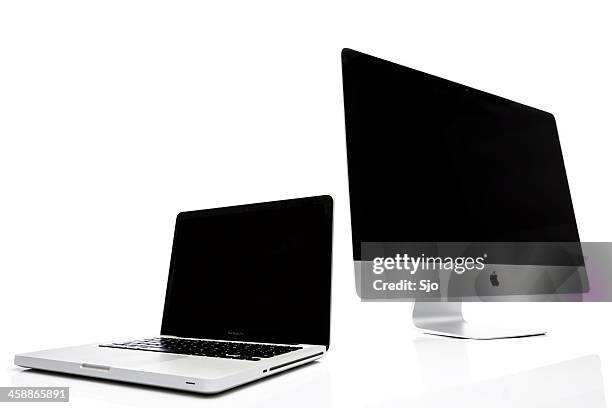 imac and macbook pro - apple macintosh stock pictures, royalty-free photos & images