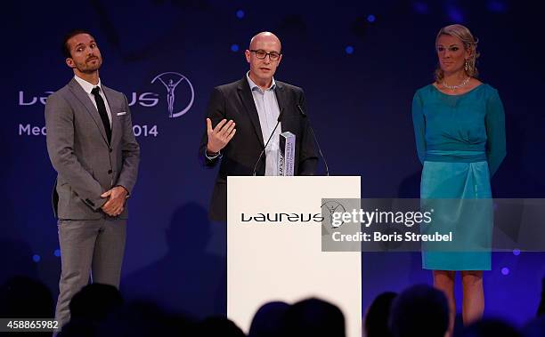 Daniel Steil of focus online, winner of the Laureus award 'Sprit for Laureus online' and German alpine ski athlete, Maria Hoefl-Riesch attend the...