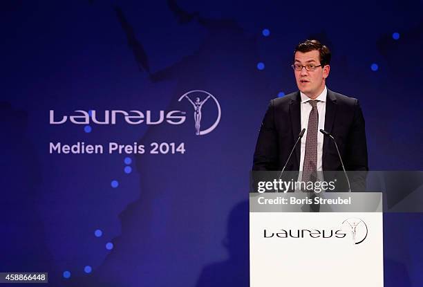 Jens Thiemer, head of brand communications for Daimler AG's Mercedes Benz cars attends the Laureus Media Award 2014 at Grand Hyatt Hotel on November...