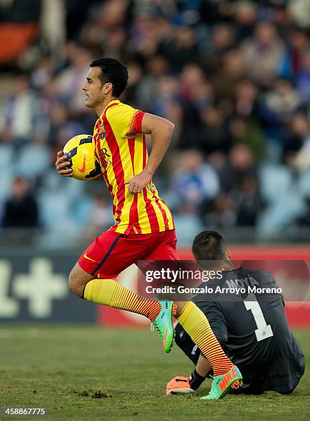 Pedro Rodriguez Ledesma of FC Barcelona celebrates scoring their opening goal during the La Liga match between Getafe CF and FC Barcelona at Coliseum...