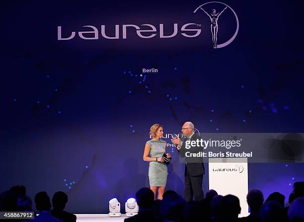 Kathi Woerndl , Austrian TV presenter and Franz Beckenbauer attend the Laureus Media Award 2014 at Grand Hyatt Hotel on November 12, 2014 in Berlin,...