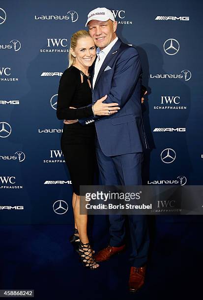 Laureus ambassadors Axel Schulz poses with his wife Patricia Schulz prior to the Laureus Media Award 2014 at Grand Hyatt Hotel on November 12, 2014...