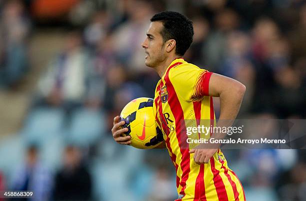 Pedro Rodriguez Ledesma of FC Barcelona celebrates scoring their opening goal during the La Liga match between Getafe CF and FC Barcelona at Coliseum...