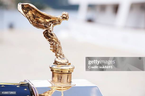 spirit of ecstasy - expensive statue stockfoto's en -beelden