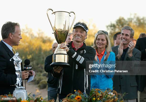 Bernhard Langer of Germany, alongside wife Vikki Carol, is awarded the Charles Schwab Cup after winning the season championship which concluded in...