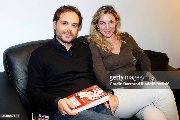 Writer Romain Sardou, here with his wife Francesca, presents his books 'Fraulein France' and his strip cartoon 'Maxence' during the 'Vivement...