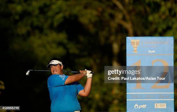 Kiradech Aphibarnrat of Thailand plays a shot during round one of the Chiangmai Golf Classic at Alpine Golf Resort-Chiangmai on November 13, 2014 in...