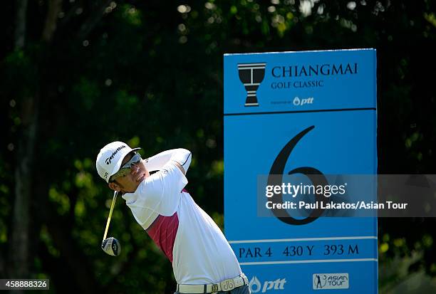 Rory Hie of Indonesia plays a shot during round one of the Chiangmai Golf Classic at Alpine Golf Resort-Chiangmai on November 13, 2014 in Chiang Mai,...