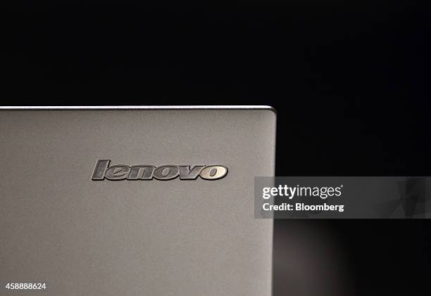Lenovo Group Ltd. Logo is seen on a laptop computer displayed at the company's flagship store on Qianmen Street in Beijing, China, on Tuesday, Nov....