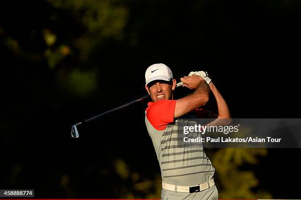 Charl Schwartzel of South Africa plays a shot during round one of the Chiangmai Golf Classic at Alpine Golf Resort-Chiangmai on November 13, 2014 in...