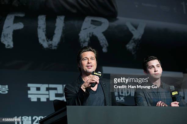 Actors Brad Pitt and Logan Lerman attend the 'Fury' press conference at Conrad Hotel on November 13, 2014 in Seoul, South Korea. The film will open...