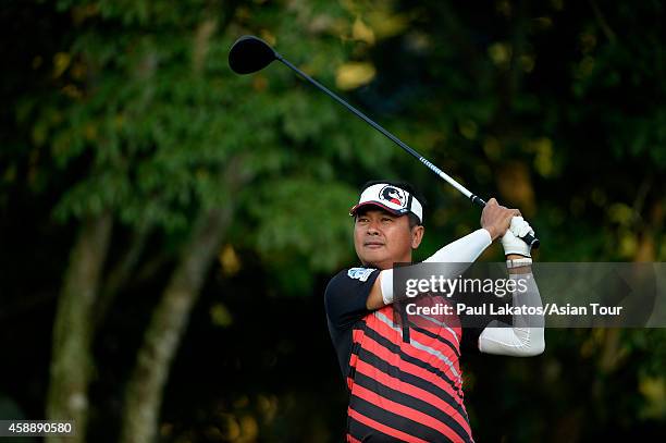 Lin Wen-tang of Chinese Taipei plays a shot during round one of the Chiangmai Golf Classic at Alpine Golf Resort-Chiangmai on November 13, 2014 in...