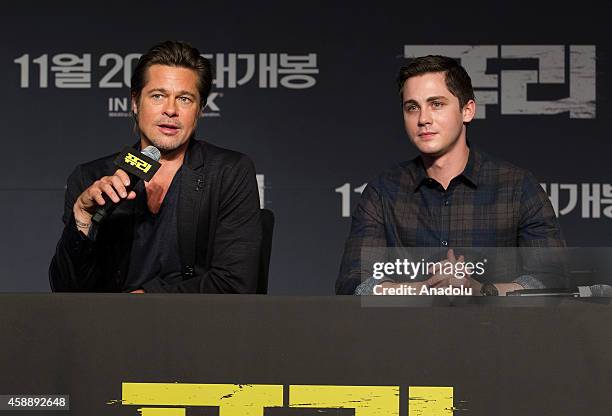 Actors Brad Pitt and Logan Lerman attend a press conference to promote the movie 'Fury' at Conrad hotel on November 13, 2014 in Seoul, South Korea.