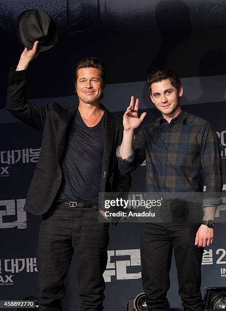 Actors Brad Pitt and Logan Lerman attend a press conference to promote the movie 'Fury' at Conrad hotel on November 13, 2014 in Seoul, South Korea.