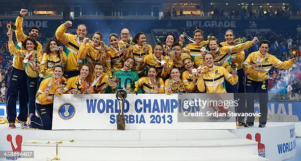 Brazil players celebrate with Gold medal after beating Serbia in their World Women's Handball Championship 2013 Final match at Kombank Arena Hall on...