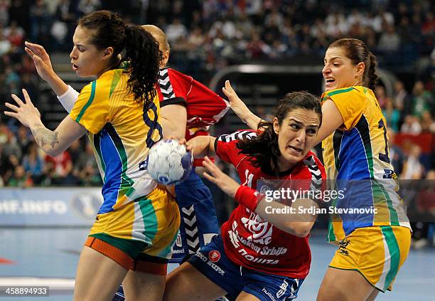 Sanja Damnjanovic of Serbia in action during the World Women's Handball Championship 2013 Final match between Brazil and Serbia at Kombank Arena Hall...