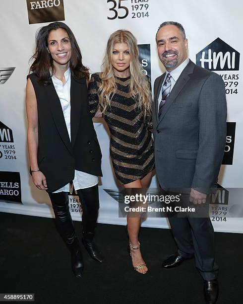 Darra Gordon, Fergie and Thomas Krever arrive for the 2014 Emery Awards at Cipriani Wall Street on November 12, 2014 in New York City.