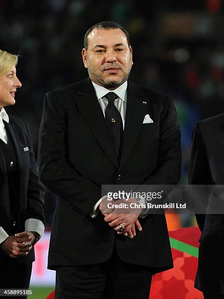 Morocco's King Muhammad VI looks on following the FIFA Club World Cup Final match between Bayern Muenchen and Raja Casablanca at Marrakech Stadium on...
