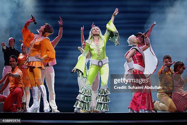 Cast members, Geraldine Fitzgerald, Sara Poyzer and Sue Devaney of the broadway musical 'Mamma Mia!' perform on stage during the media call at the...