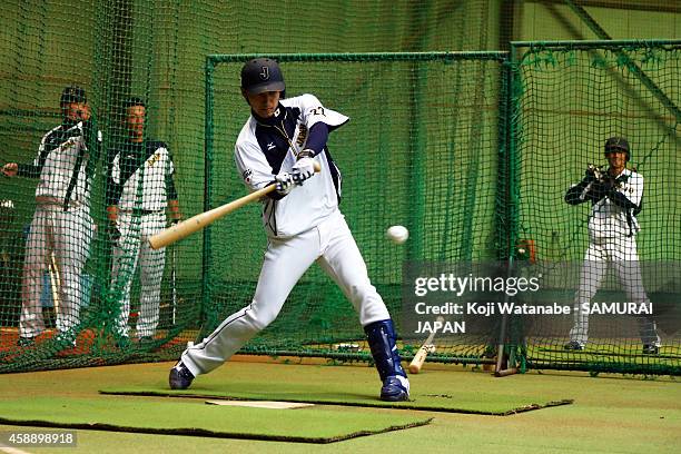 Catcher Hikaru Ito of Samurai Japan in action during a training session at Jing Gaien Indoor Practice Place on November 13, 2014 in Tokyo, Japan.