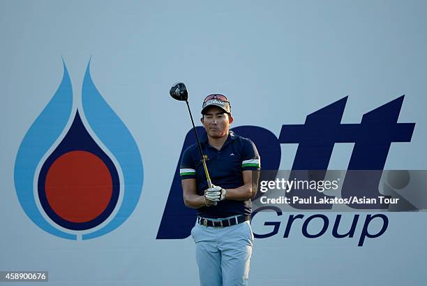 Sattaya Supupramai of Thailand plays a shot during round one of the Chiangmai Golf Classic at Alpine Golf Resort-Chiangmai on November 13, 2014 in...