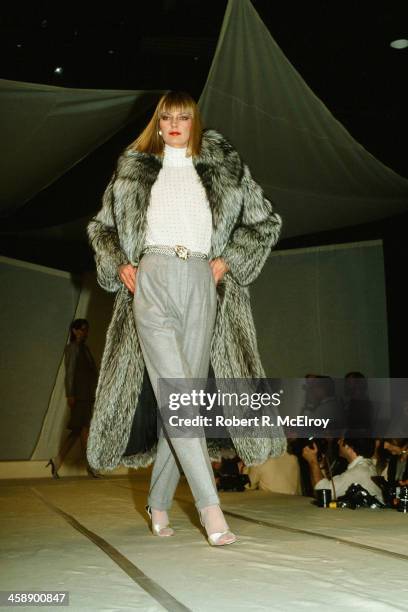 Model walks on the runway during an Anne Klein fashion show, in New York, April 23, 1982.