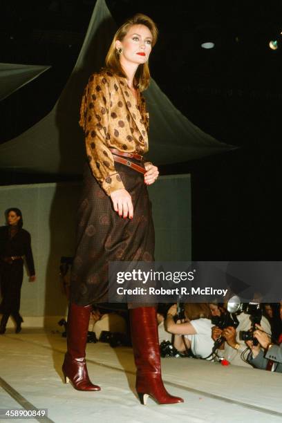 Model walks on the runway during an Anne Klein fashion show, in New York, April 23, 1982.