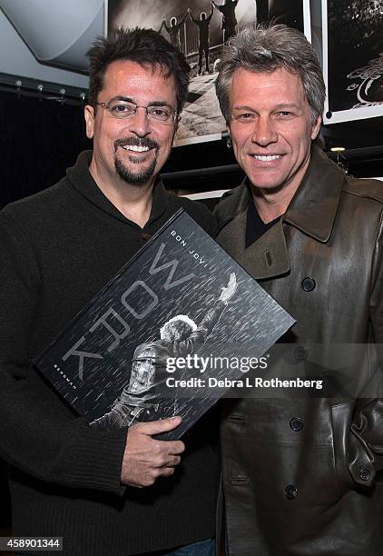 Author/Photographer David Bergman and Musician Jon Bon Jovi at Altman Building on November 12, 2014 in New York City.