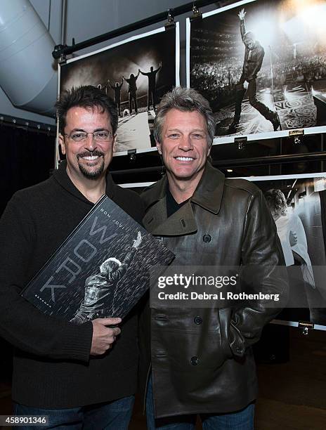 Author/Photographer David Bergman and Musician Jon Bon Jovi at Altman Building on November 12, 2014 in New York City.