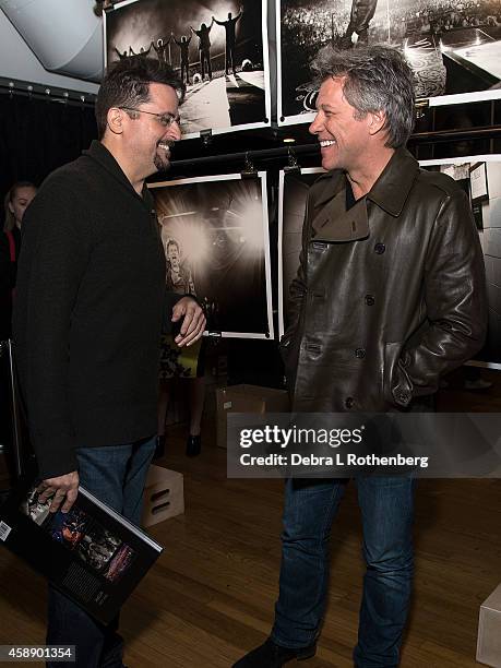 Author/Photographer David Bergman and Musician Jon Bon Jovi at Altman Building on November 12, 2014 in New York City.