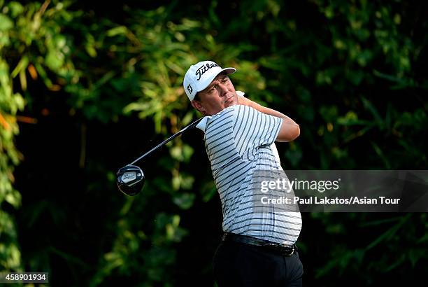 Jason Dufner of the USA plays a shot during round one of the Chiangmai Golf Classic at Alpine Golf Resort-Chiangmai on November 13, 2014 in Chiang...