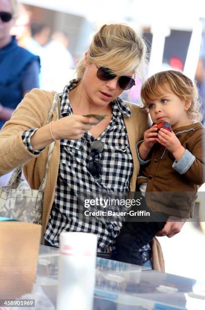 Slema Blair and her son, Arthur Bleick, are seen at the Studio City Farmers Market on December 22, 2013 in Los Angeles, California.