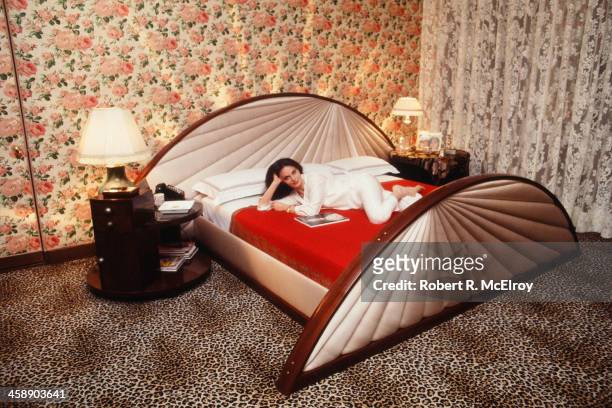 Portrait of Belgian-born American fashion designer Diane von Furstenberg reclining at home in her bedroom, New York, June 6, 1978.